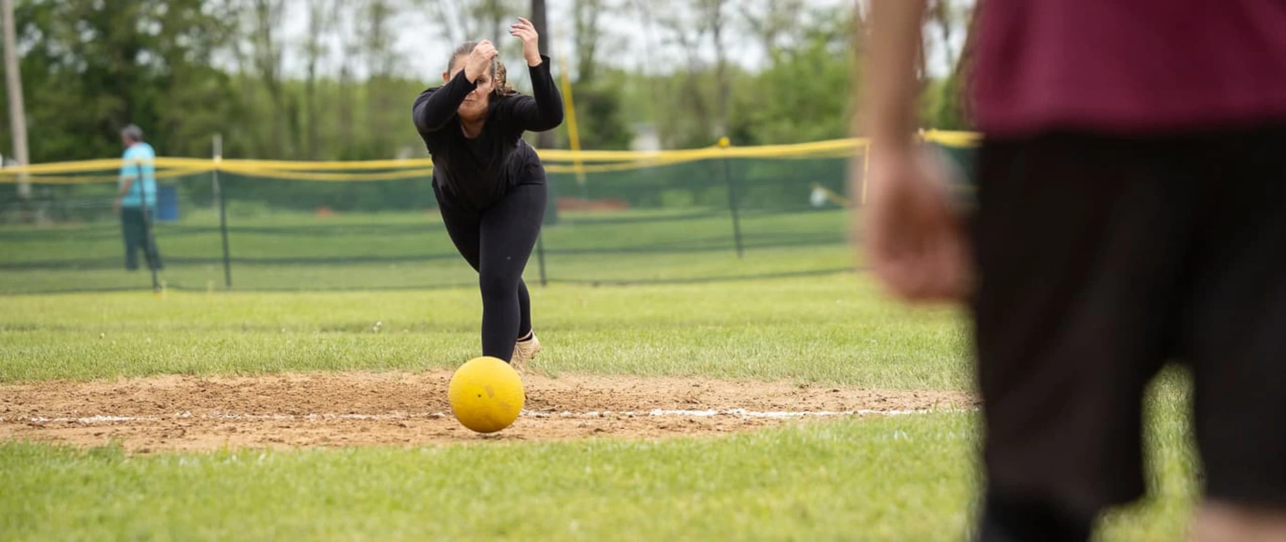Kickball players in action